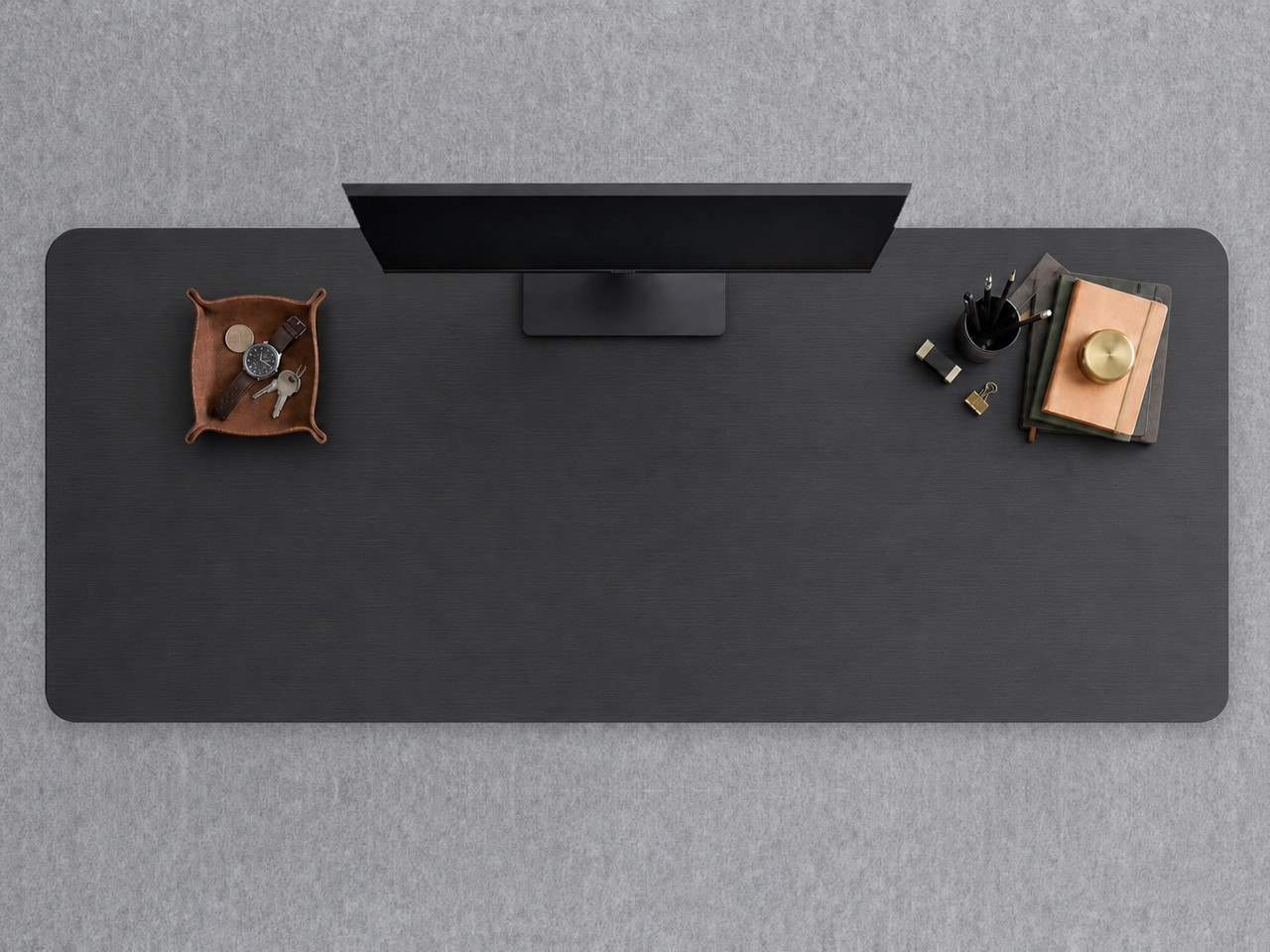 A JoyDesk desk topped in Black Laminate at 1800mm, seen from above