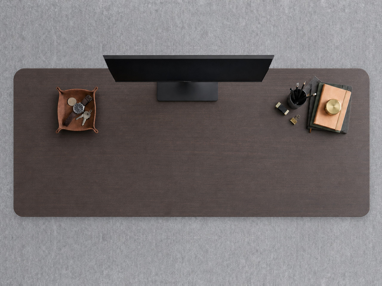 A JoyDesk desk topped in Dark Walnut Laminate at 1800mm, seen from above