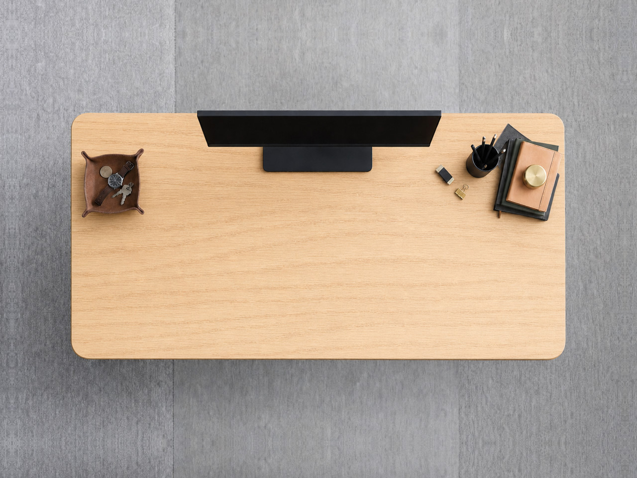 A JoyDesk desk topped in Light Oak Rubberwood at 1500mm, seen from above