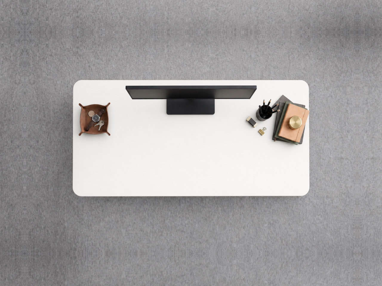 A JoyDesk desk topped in White Laminate at 1200mm, seen from above